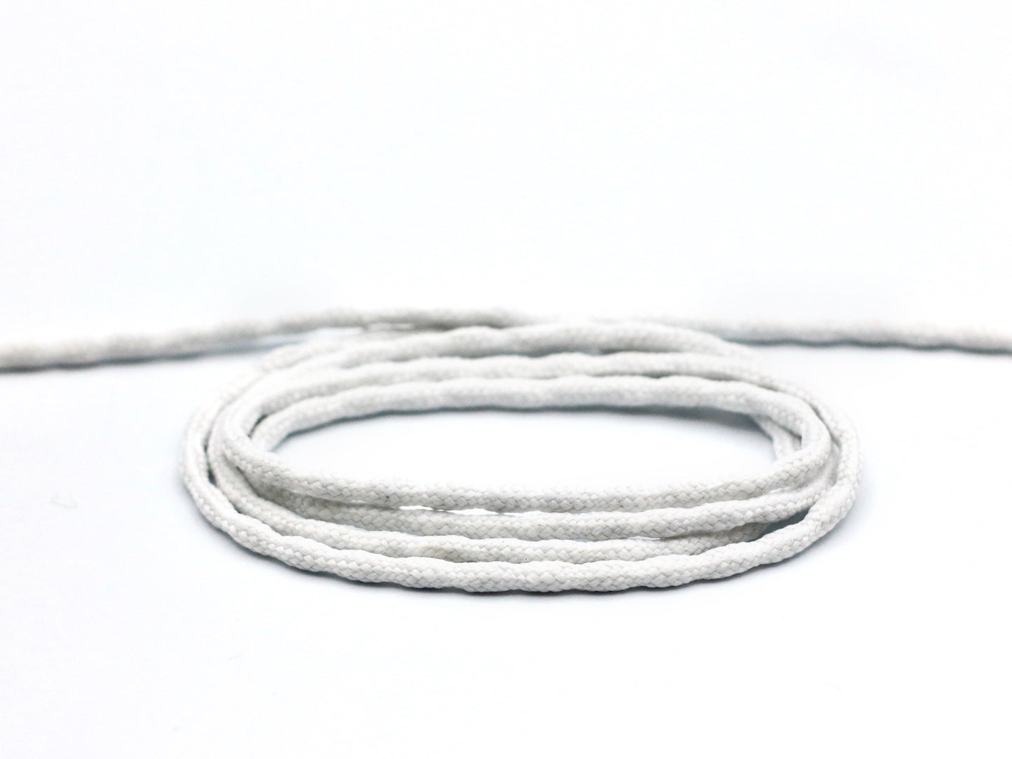Cape weight, a metal chain encased in white cotton