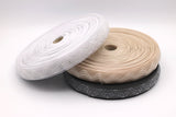 Silicone horsehair elastic. Gripper Elastic. Wig band. Three spools, one of white, beige and black