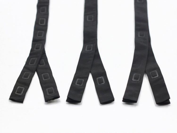 3 pieces of magnetic snap tape in black with 9cm interval between snaps