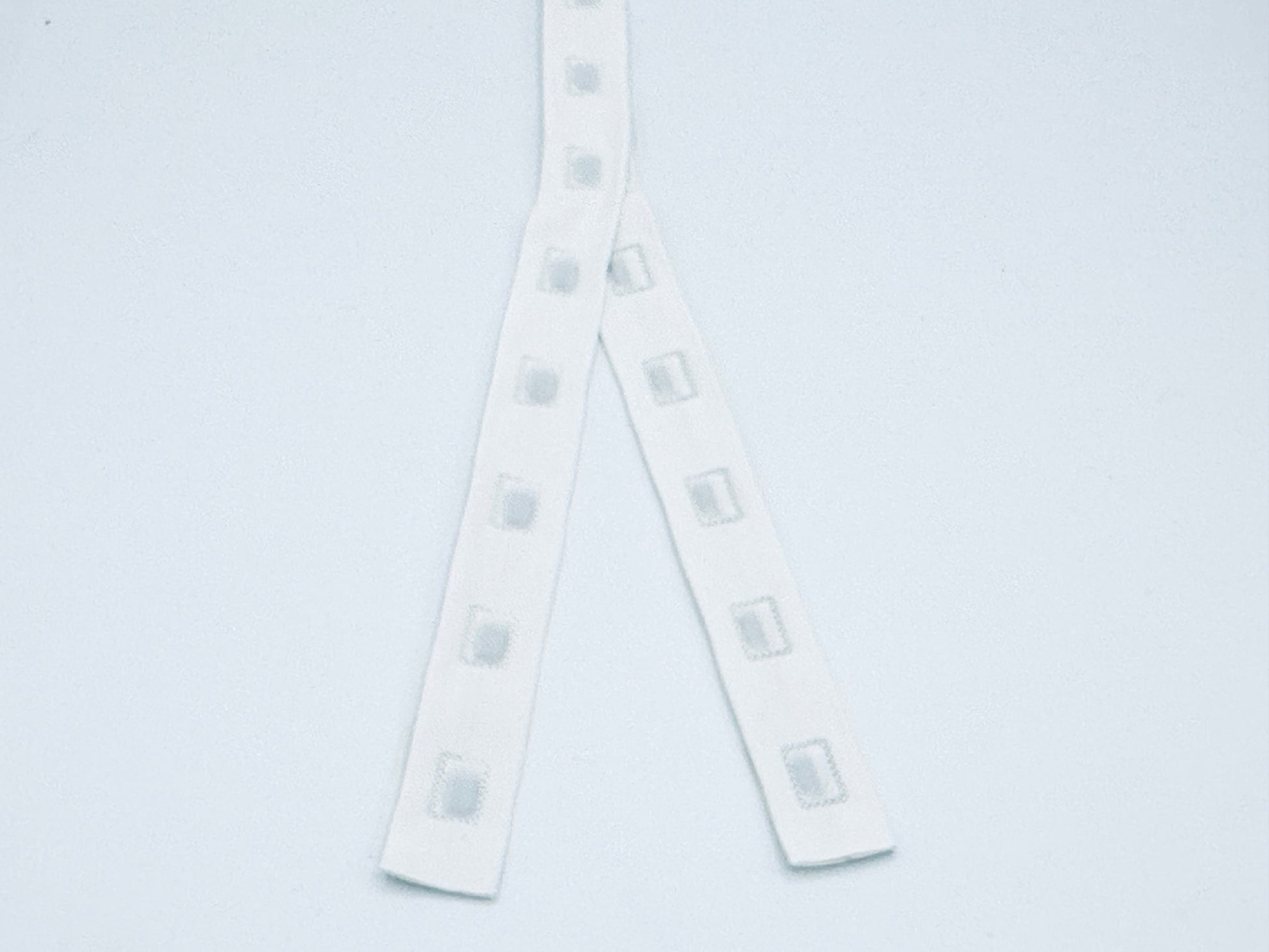 White 3 cm spaced extra strength snap tape