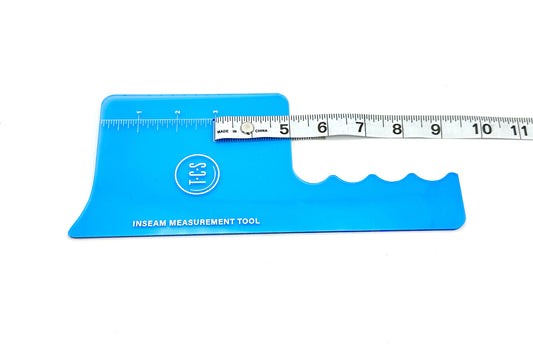 Blue transparent plastic inseam tool with tape measure attachment