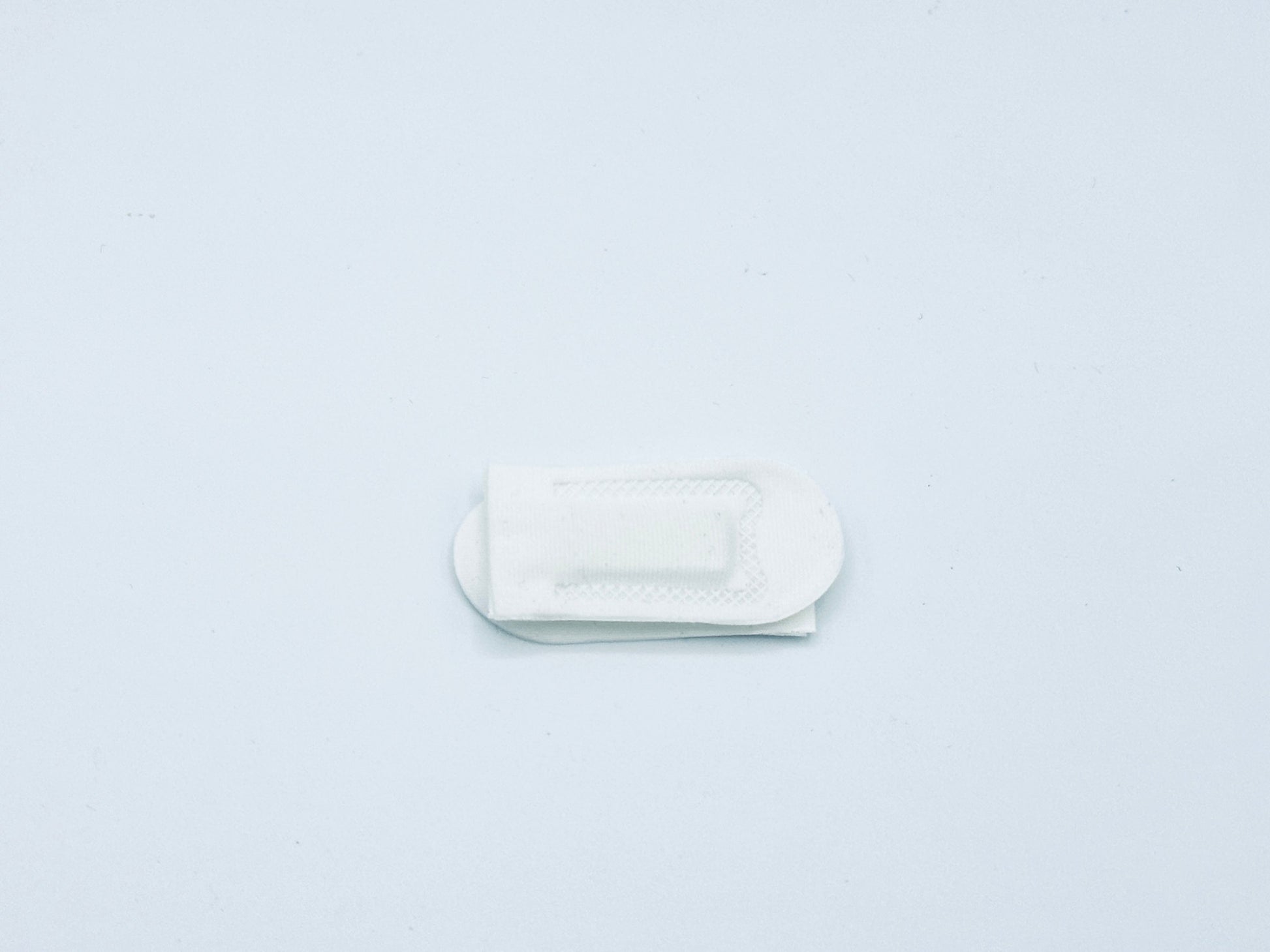 1 set of small white quick rig tabs