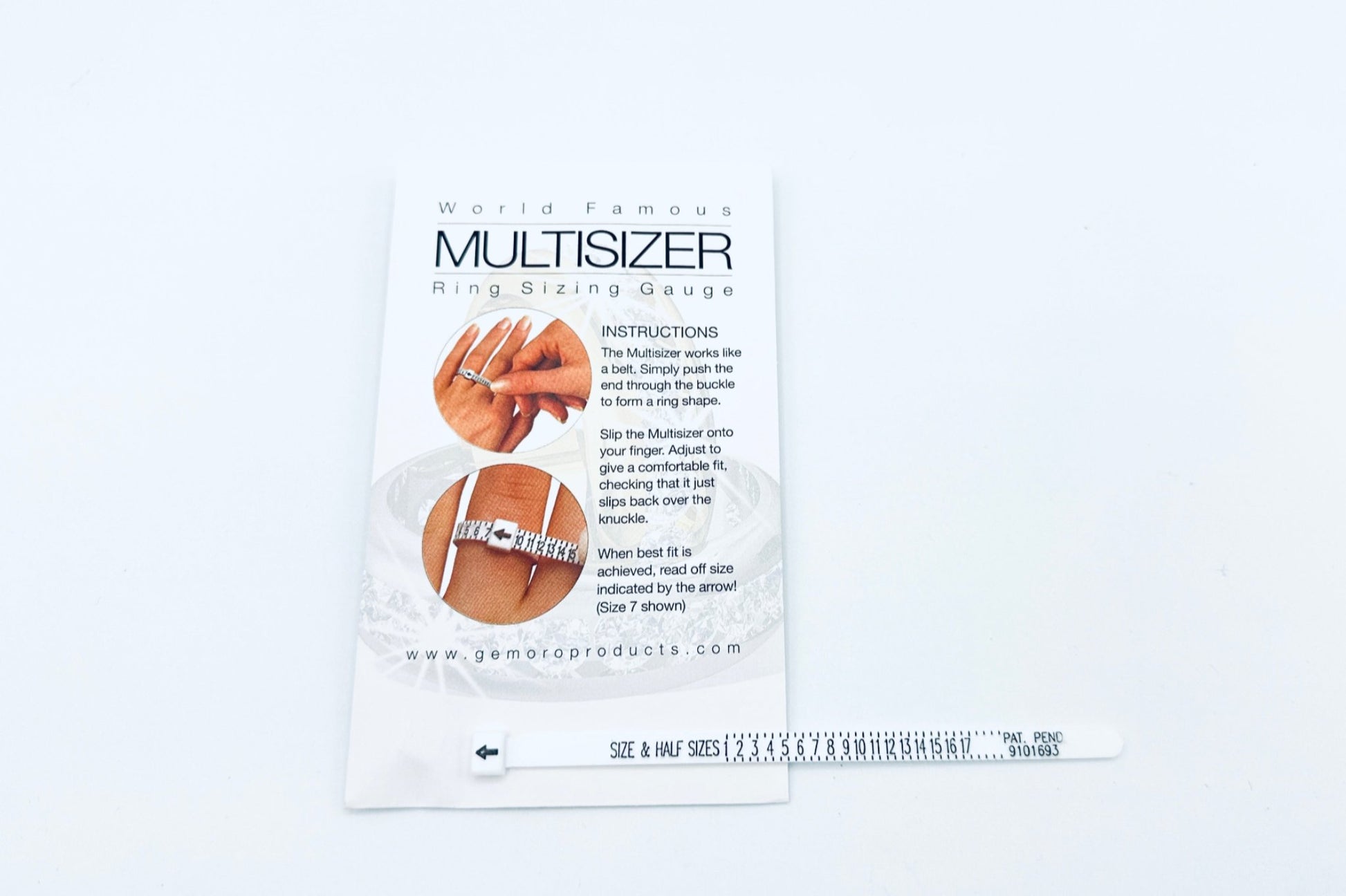 A white tape ring sizer in a printed envelope