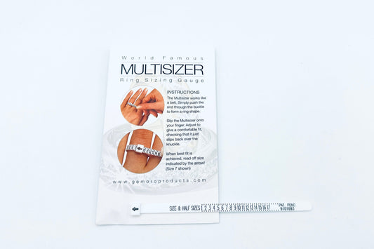 A white tape ring sizer in a printed envelope