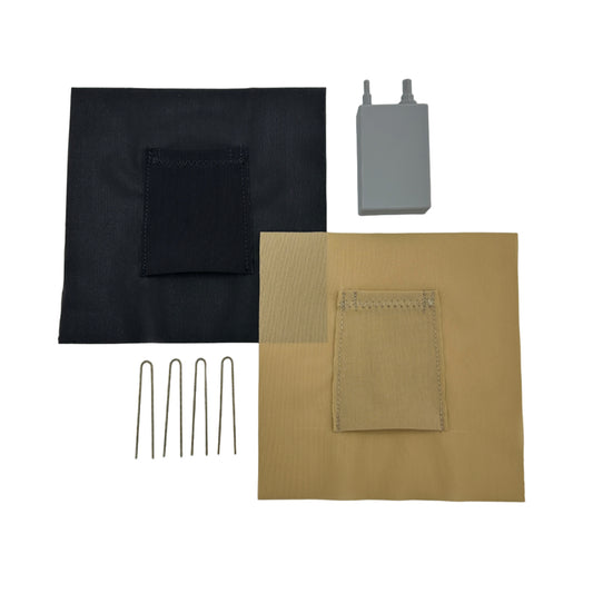 2 wig packs made of stretch mesh in beige and black with hairpins and a mic transmitter next to them