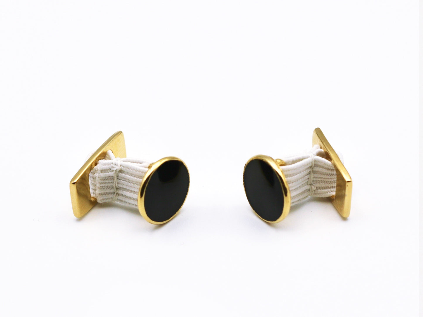 1 pair of black enamel center goldtone quick rigged cufflinks with elastic center