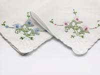 white handkerchief with pastel floral embroidered corner