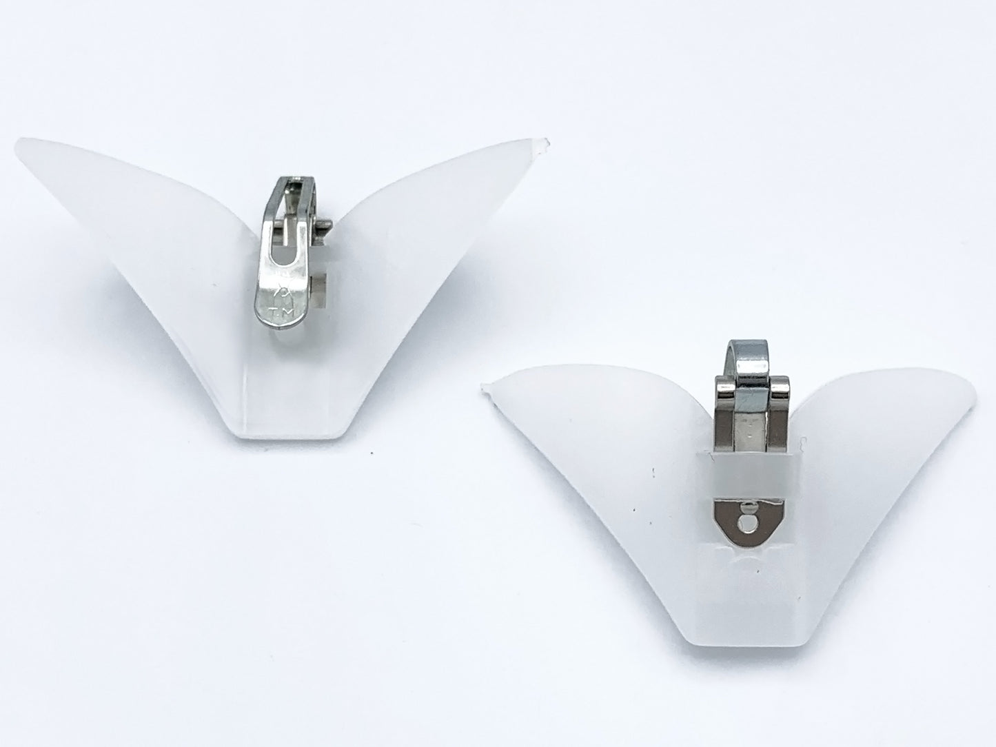 2 pieces of Large clip on tie hardware one facing forward one facing backwards