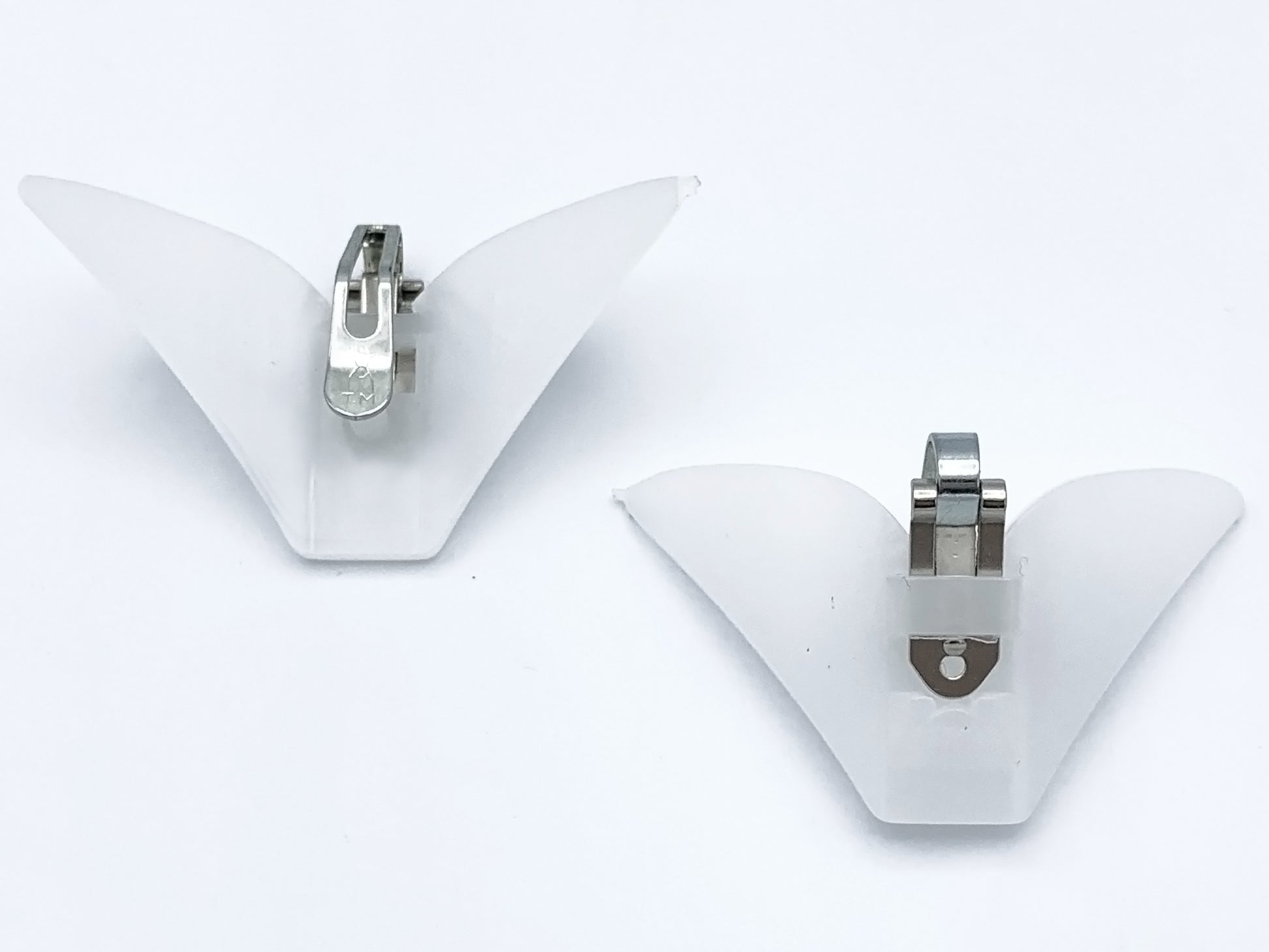 2 pieces of Large clip on tie hardware one facing forward one facing backwards
