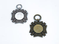 1 pair of Large Maltese Cross one in brass and one in Pewter