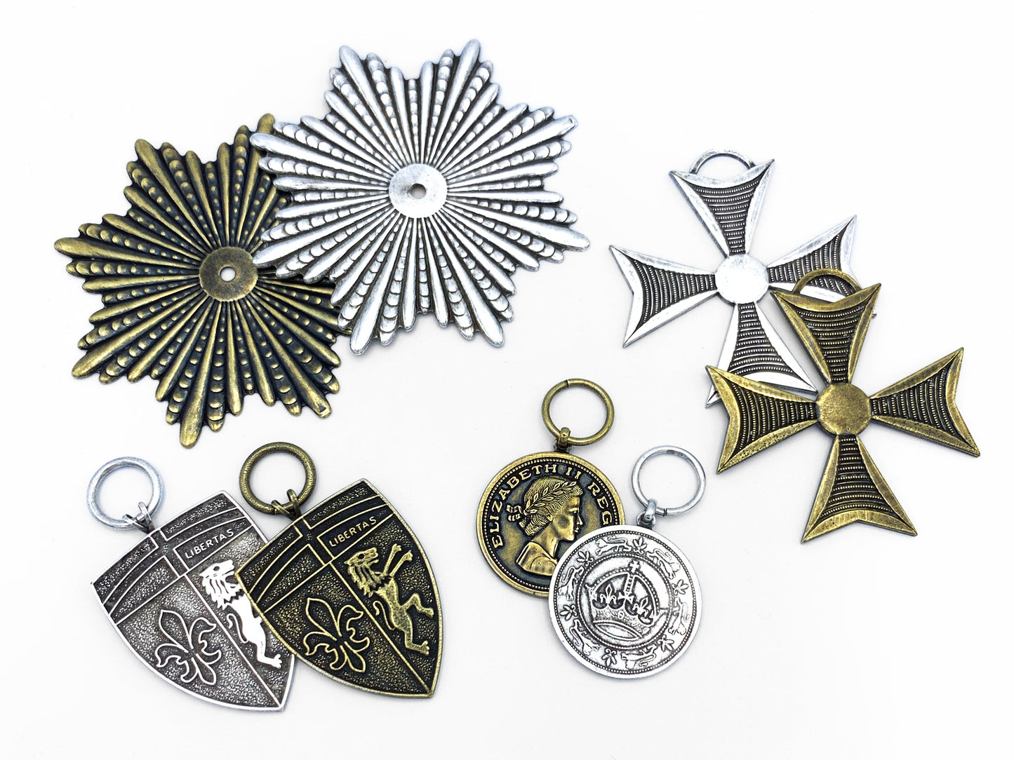 4 pairs of Faux Military Medals with one of each Brass and Pewter; Large Sunburst, Large Iron Cross, Large Shields, Medallions