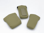3 tan microphone packs with the matching plastic replicas inside