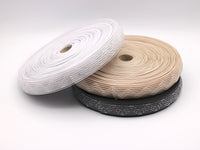 Silicone horsehair elastic. Gripper Elastic. Wig band. Three spools, one of white, beige and black