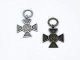 Pair of Iron Cross one in brass and one in pewter