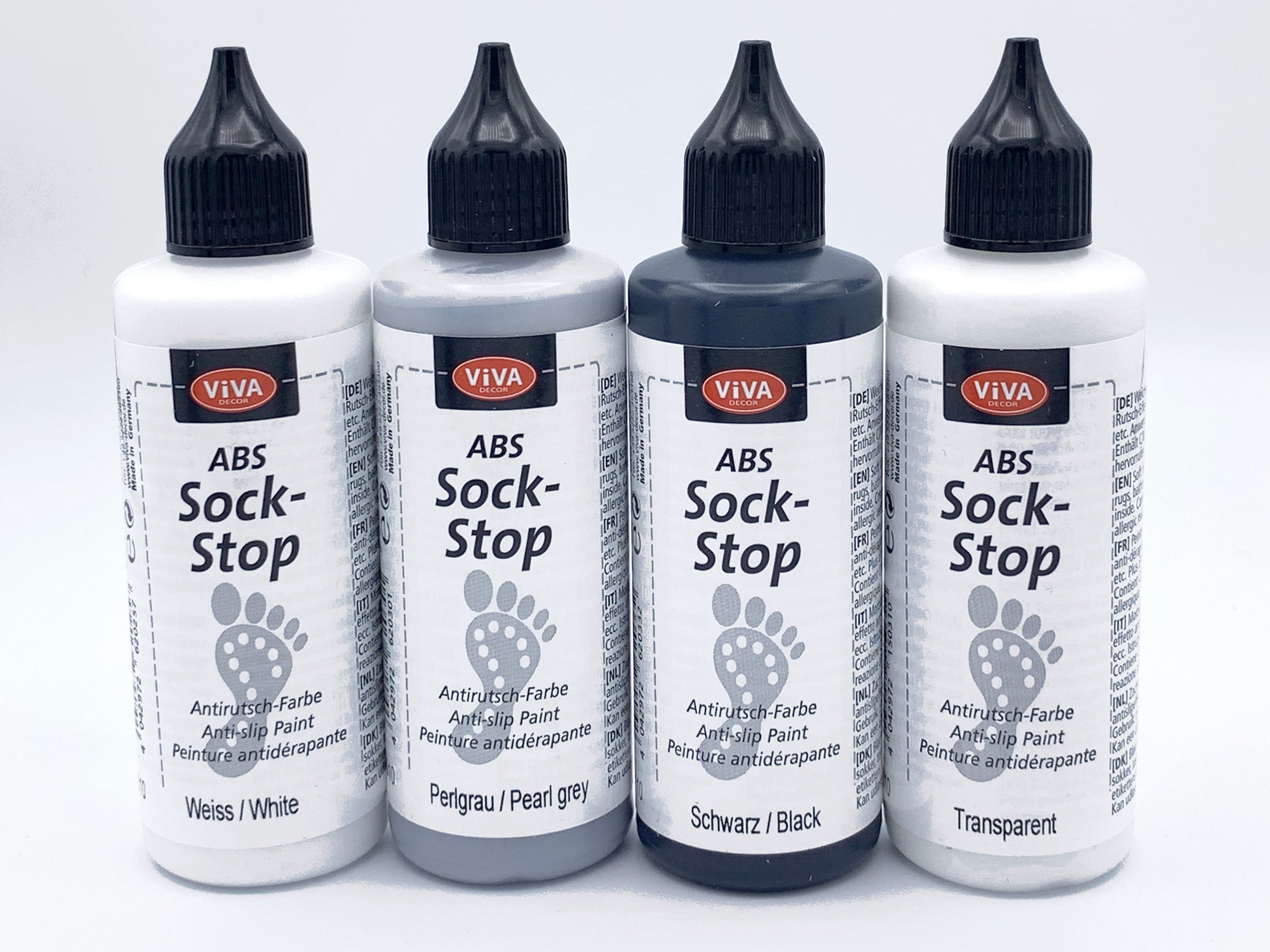 Set of 4 bottles of Sock Stop in White, Pearl Grey, Black and Transparent