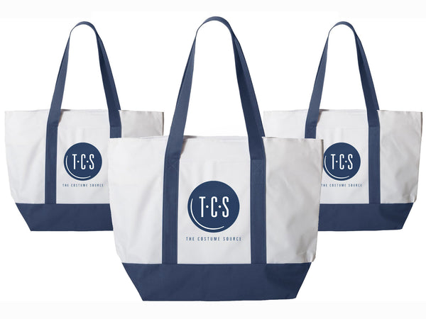 three black and white TCS branded canvas tote bags