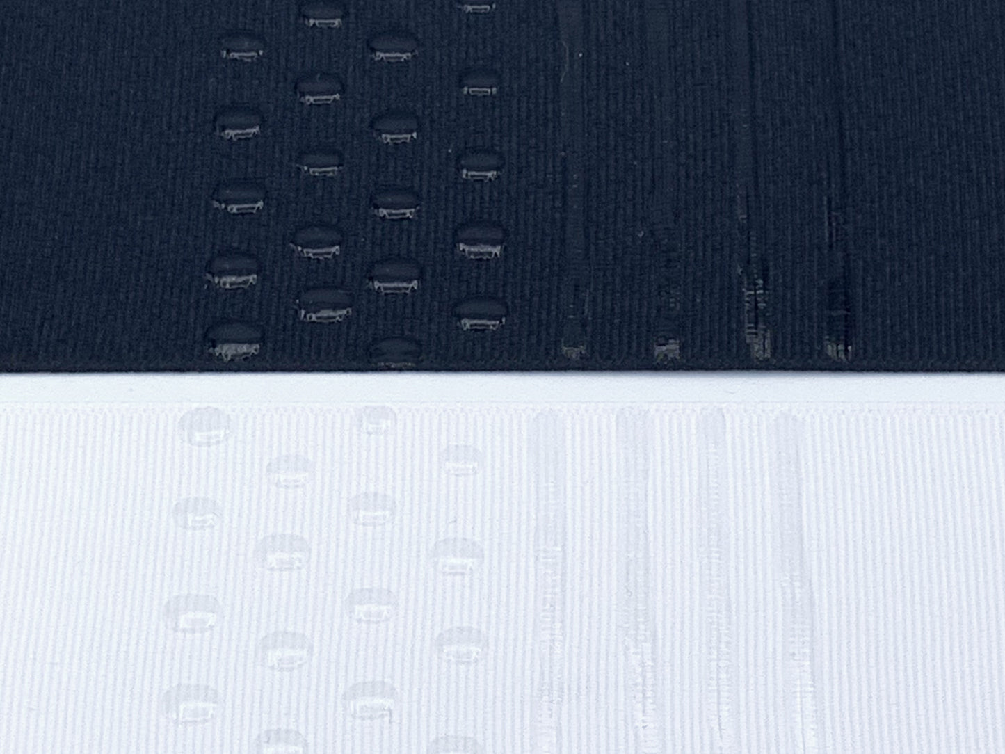 Black and white fabric with transparent sock stop drawn on in dots and stripes