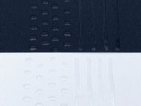 Black and white fabric with transparent sock stop drawn on in dots and stripes