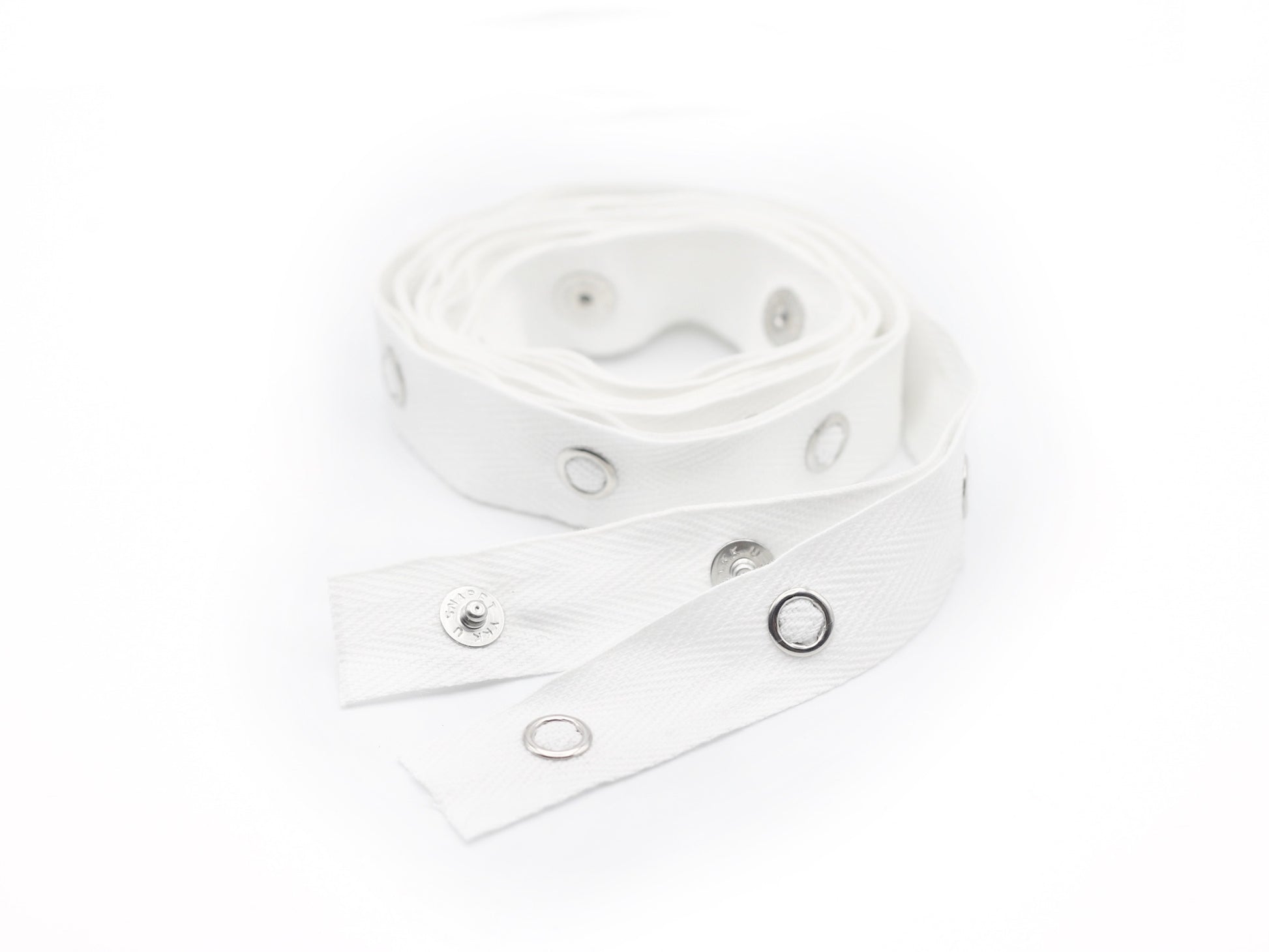Small roll of white snap tape