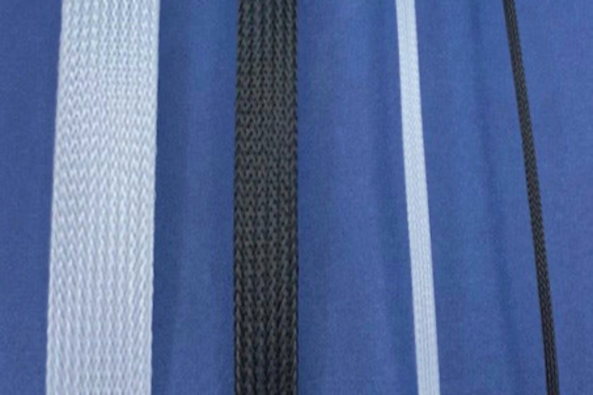 4 pieces of heavyweight horsehair alternating between white and black; 1" wide, 1/2" wide, 1/4" wide, 1/8" wide